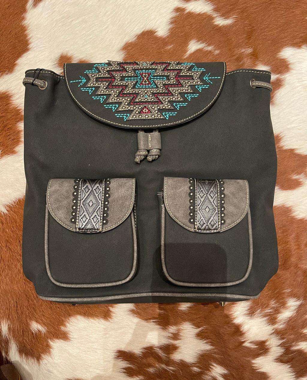 aztec leather backpack Studded Belkin Laptop Cases & left tanned leather and has Model:JB8U65-3000DG