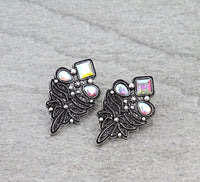 Boot stitch earrings