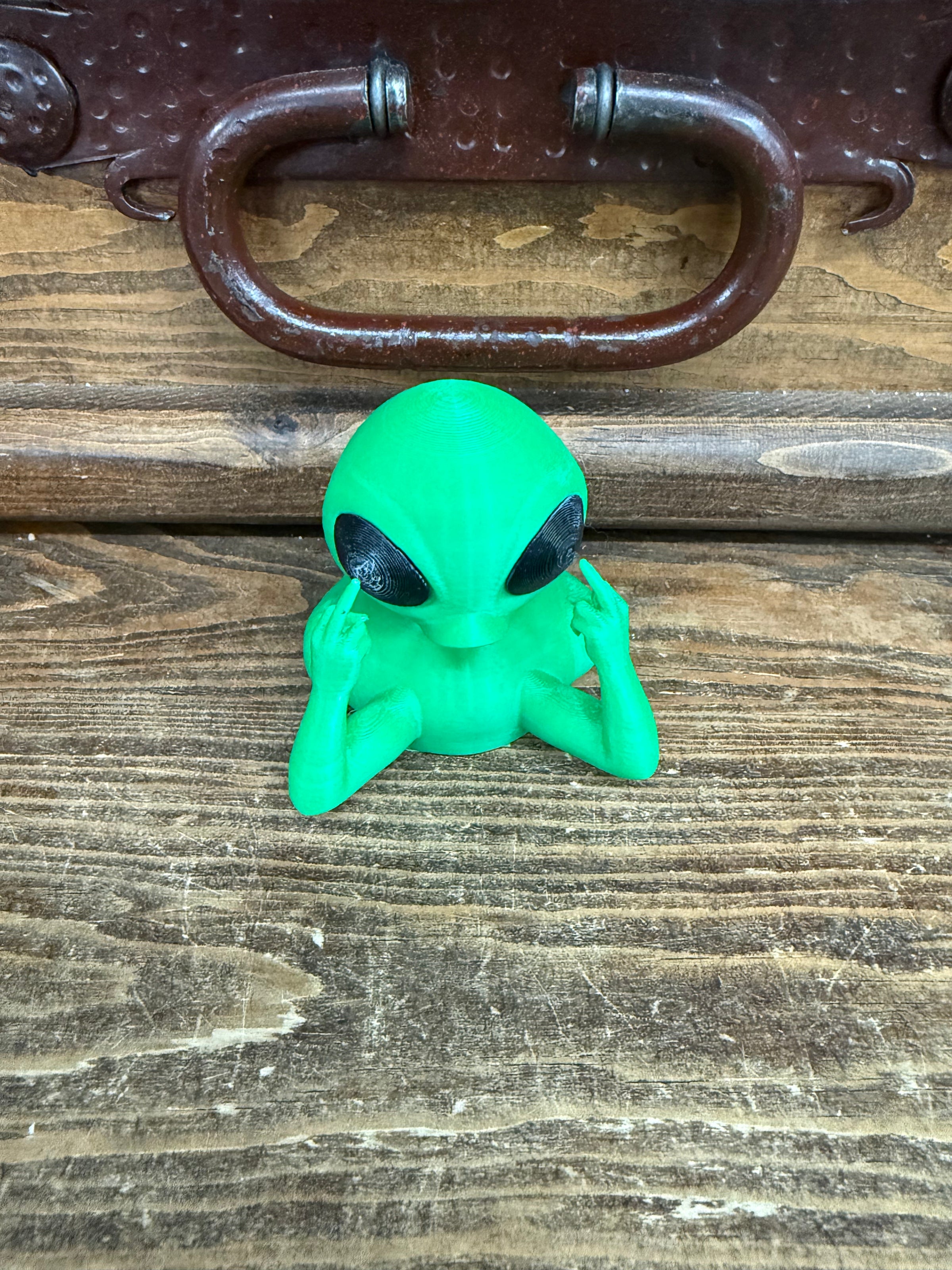 Alien middle finger 3D printed on slab