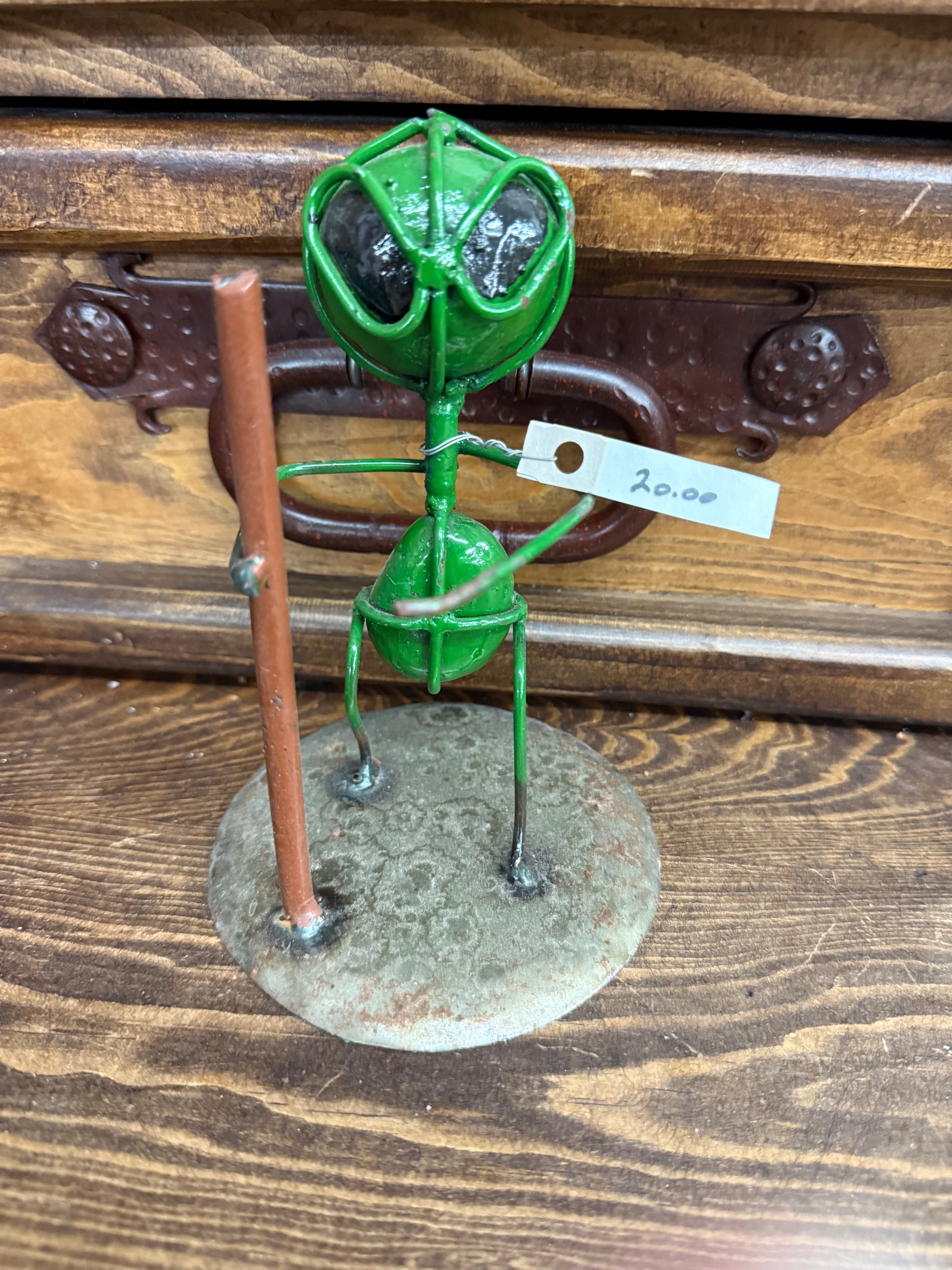 Metal & rock Alien statue hiker