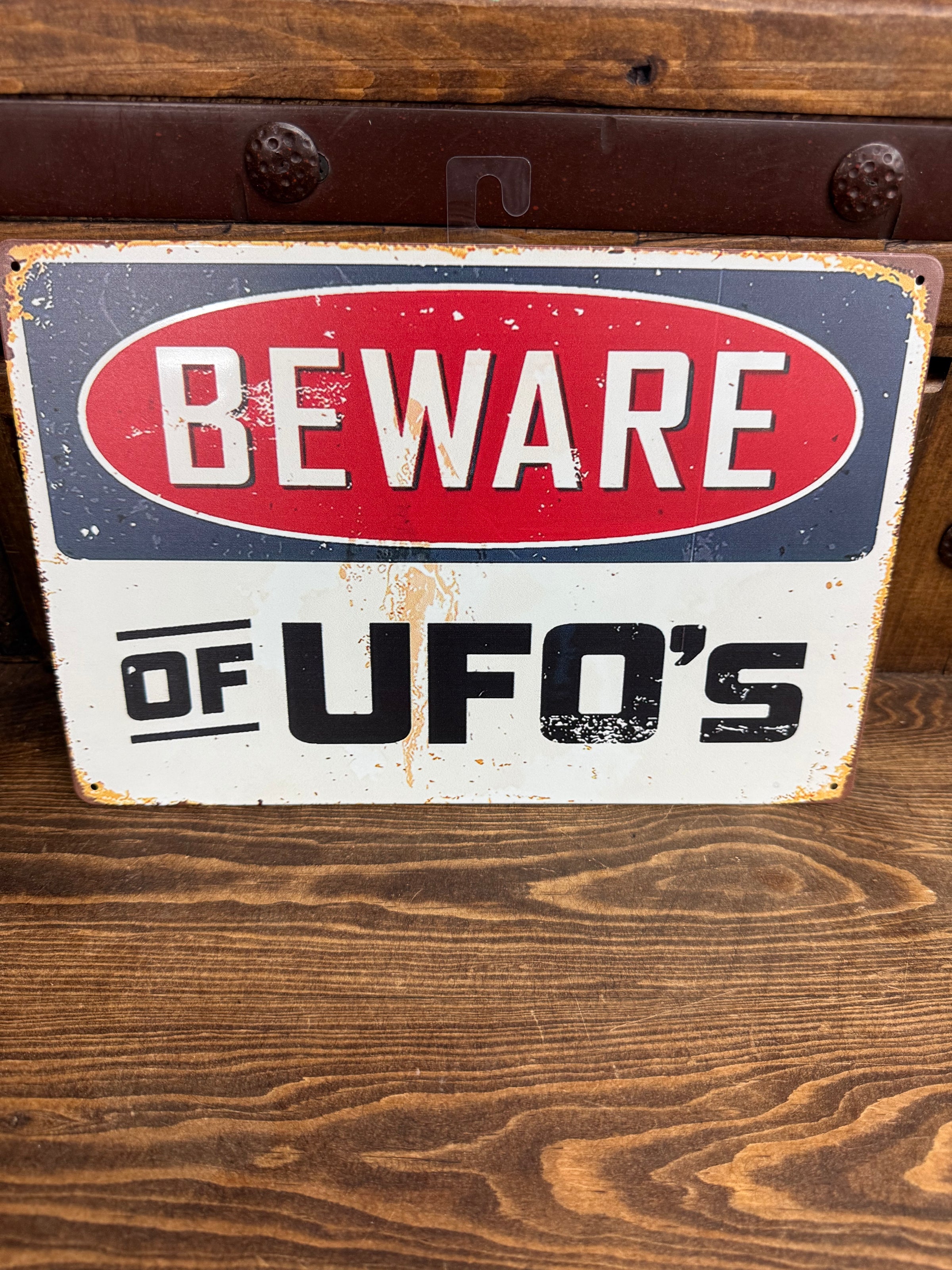 Alien metal sign