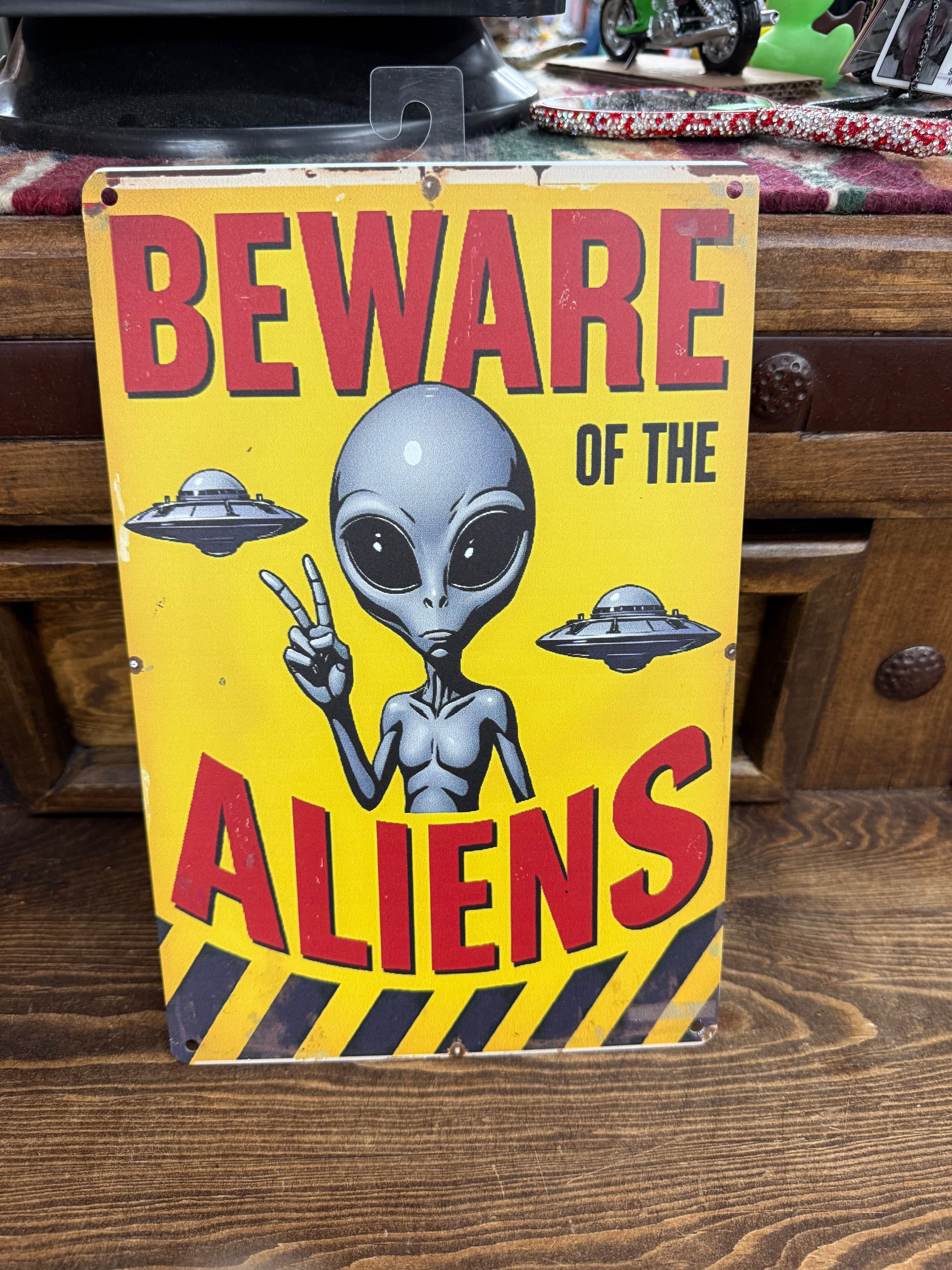 Alien metal sign