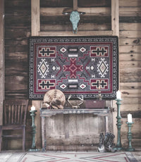 Double cross grey area rug