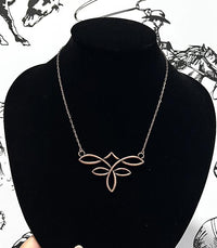 Boot stitch necklace